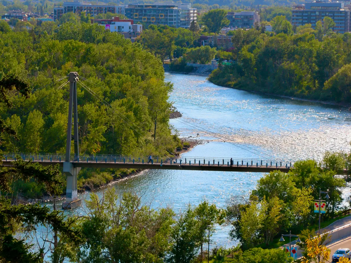 Bow River, pedestrian bridge and downtown Calgary.